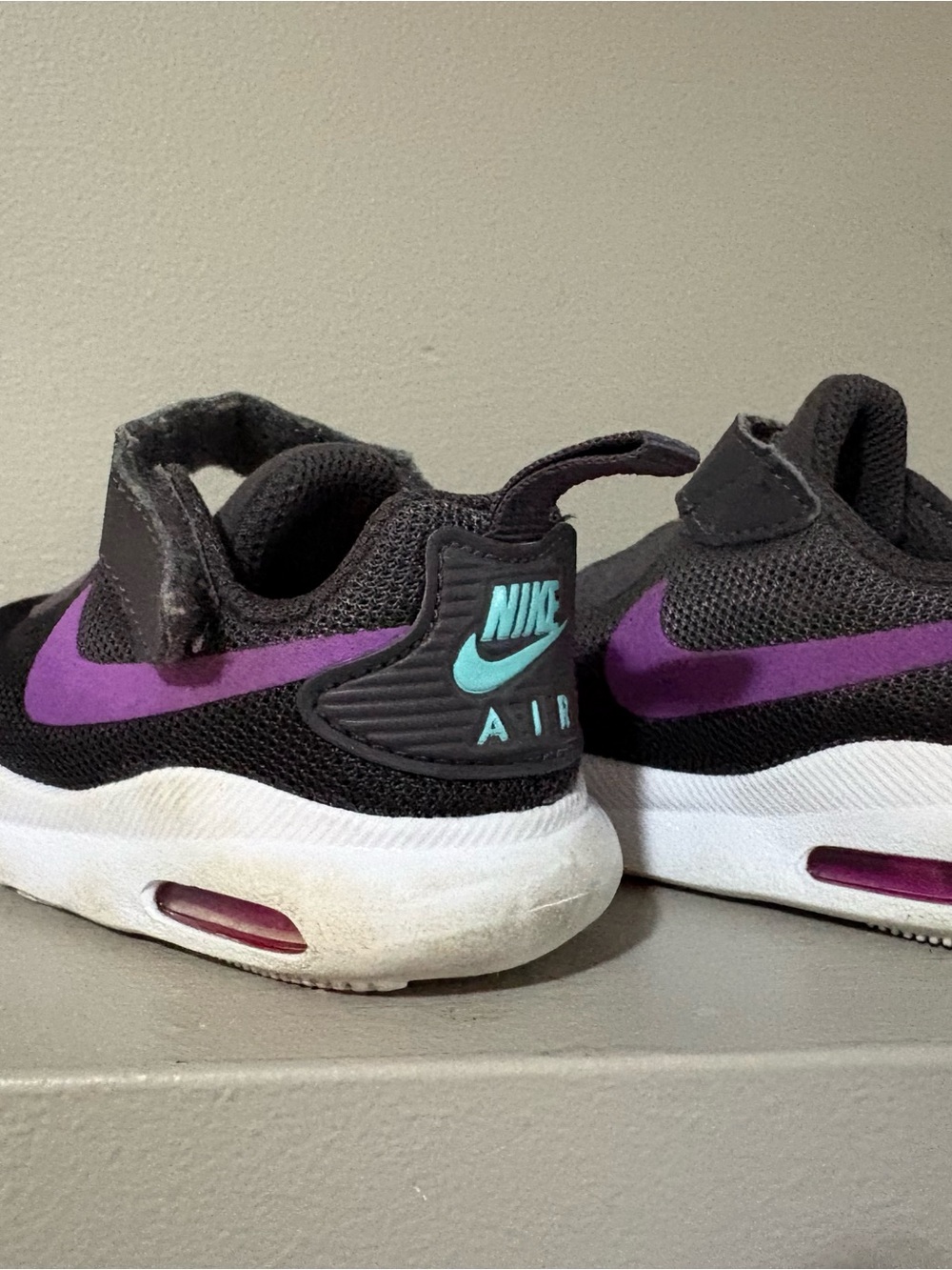 Nike Kids Black Sneakers with Purple Swoosh and Teal Logo